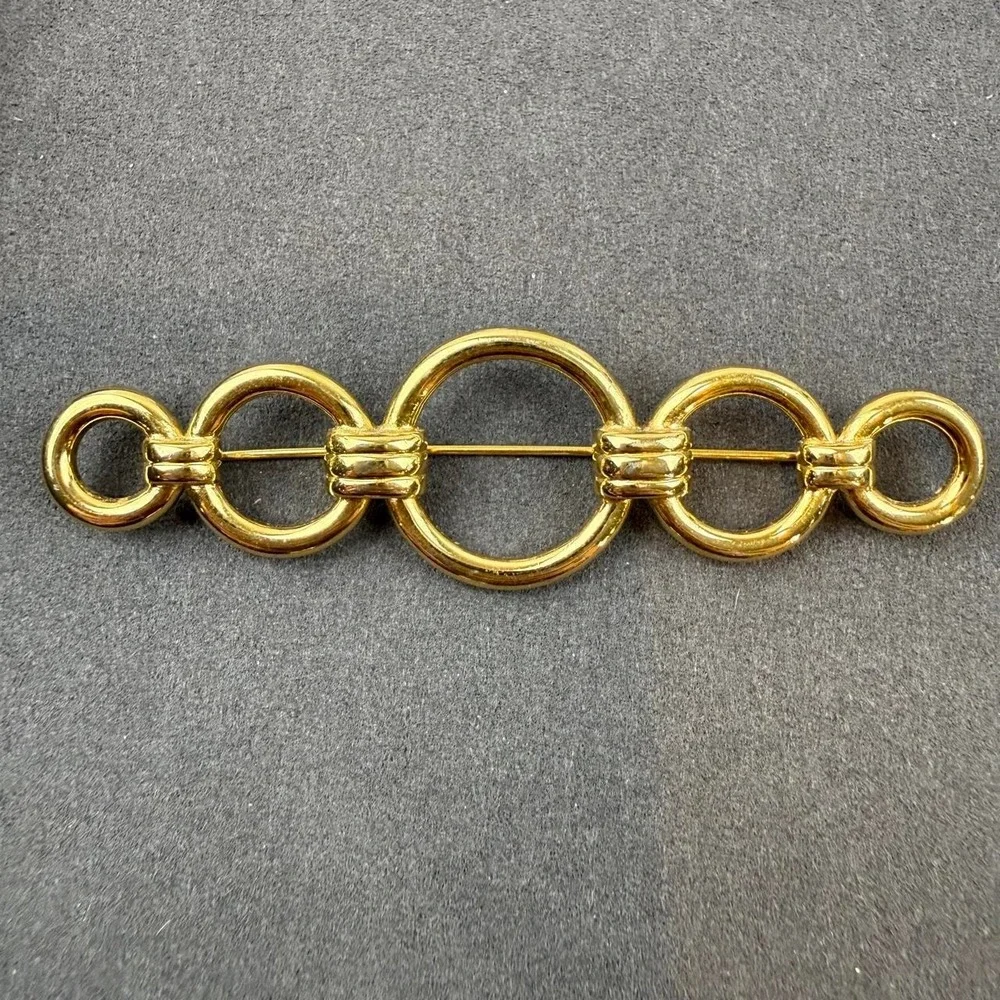 Monet Vintage Geometric Brooch Gold Tone Interlocking Circle Bar Design